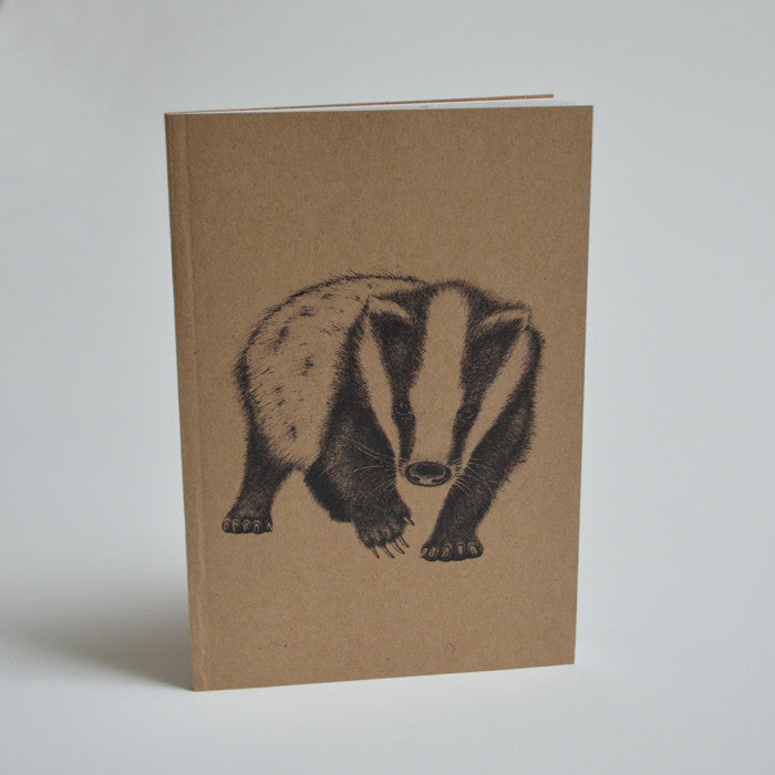 Eco-friendly notebook with badger artwork.