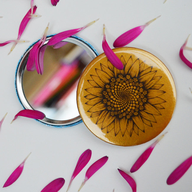Golden sunflower pocket mirror.