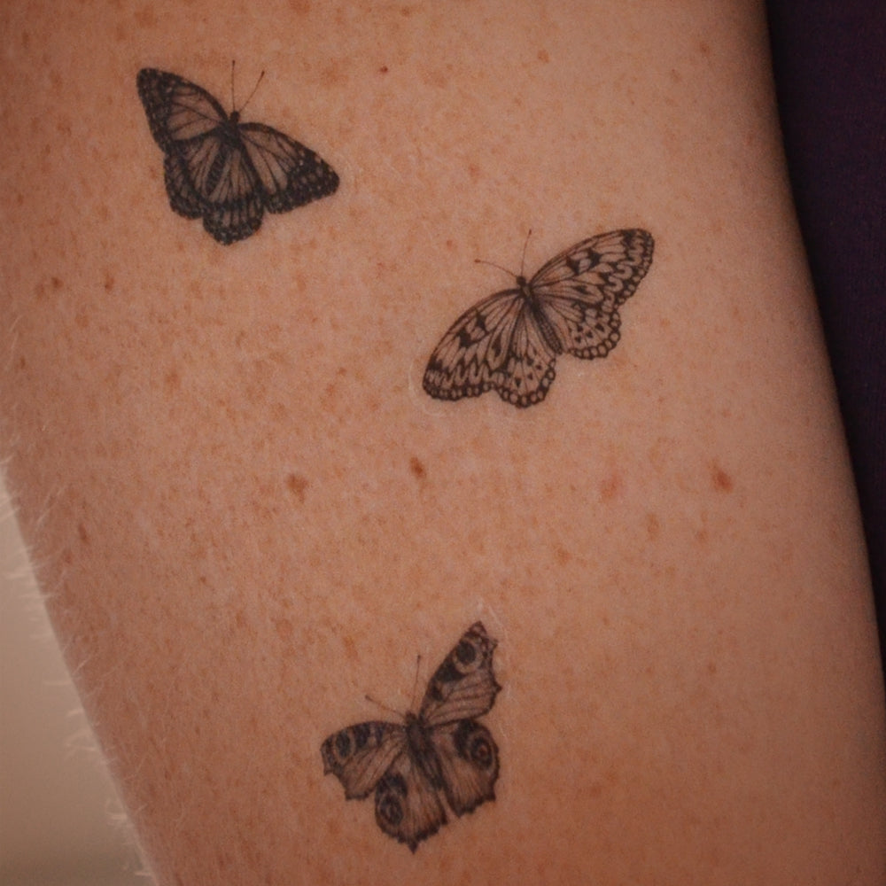 Set of five mini butterfly temporary tattoos.