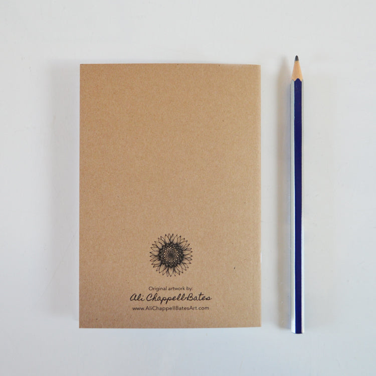 Recycled A6 notebook with raven illustration.