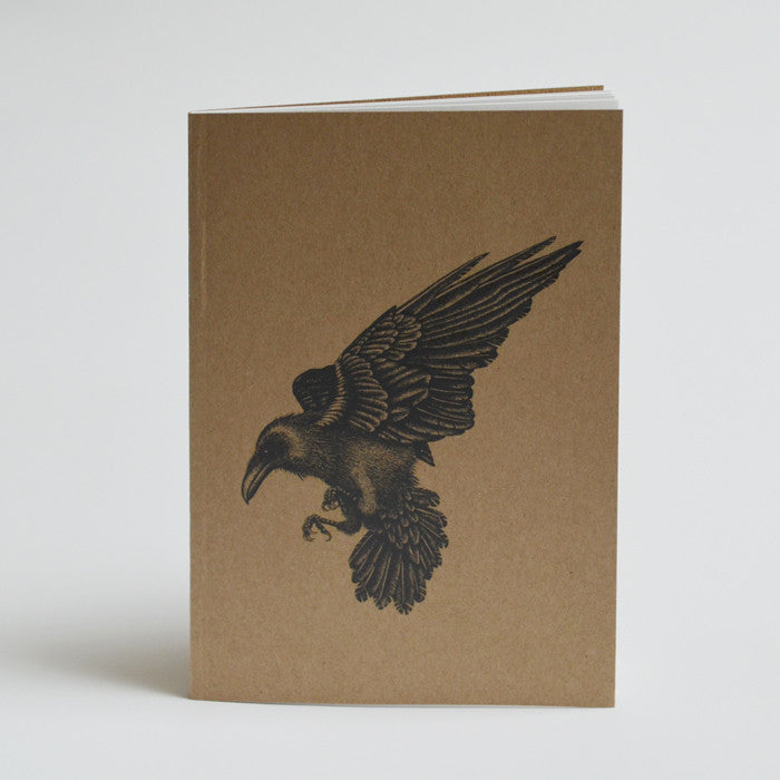 Recycled A6 notebook with raven illustration.