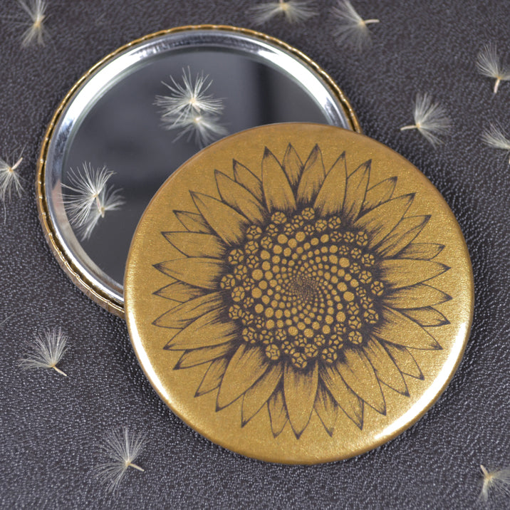 Golden sunflower pocket mirror.