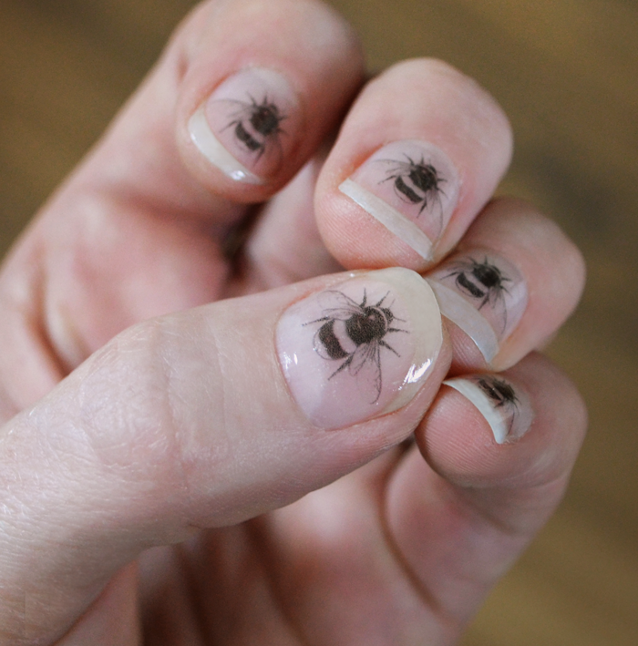Set of 12 mini Bumble bee nail decal transfers.