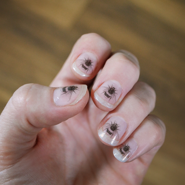 Set of 12 mini Bumble bee nail decal transfers.