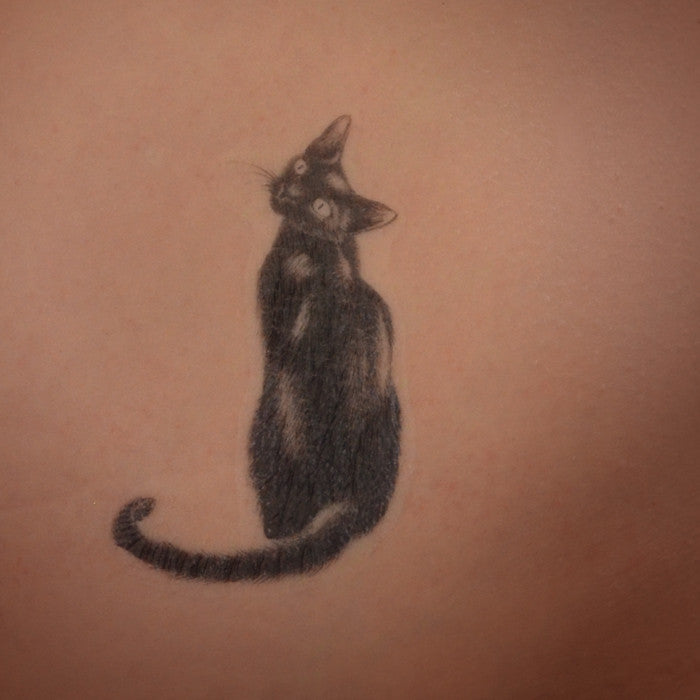 Cat Silhouette Tattoo with Heart