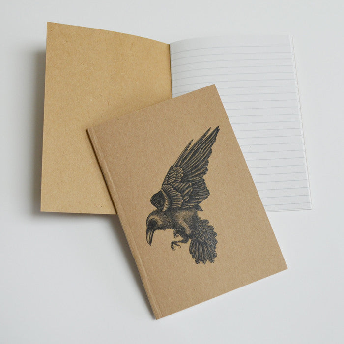 Recycled A6 notebook with raven illustration.