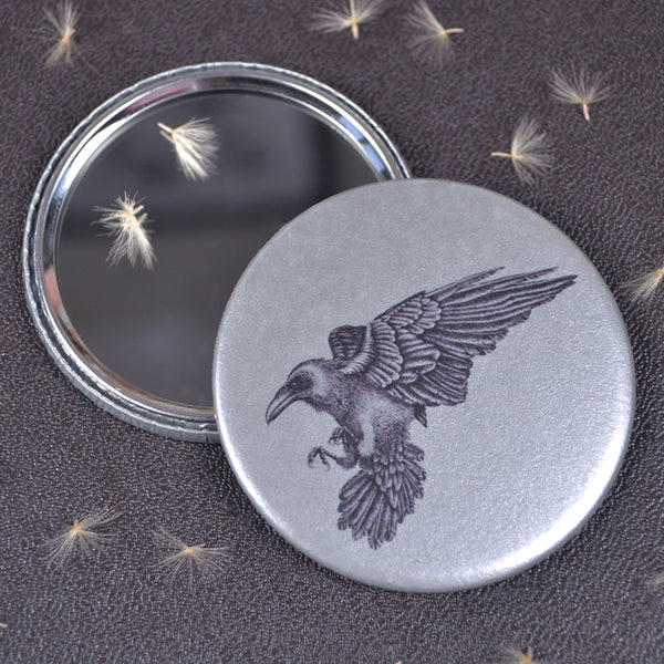 Raven compact pocket mirror