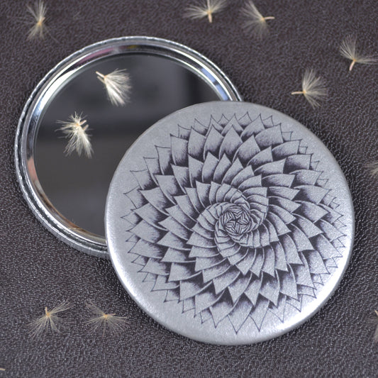 Silver Succulent spiral pocket mirror.